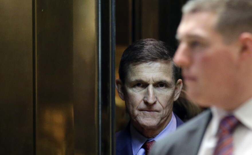 Retired Lieutenant General Michael Flynn, White House national security adviser-designate, stands in the elevator at the Trump Tower in New York, U.S., in December 2016.