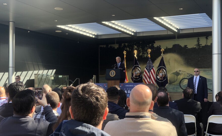 President Joe Biden addresses a crowd at tech company Viasat. Carlsbad, Calif. Nov. 4, 2022.