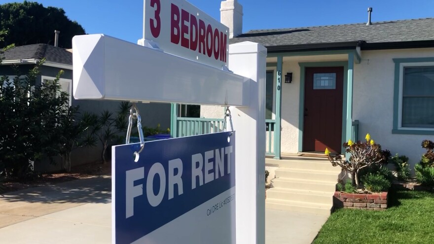 A 3 bedroom house with a 'for rent' sign out front is shown in this undated photo.