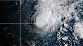 This NOAA satellite image taken Saturday, Aug. 22, 2026, shows Tropical Storm Moke advancing towards Hawaii in the Pacific Ocean.