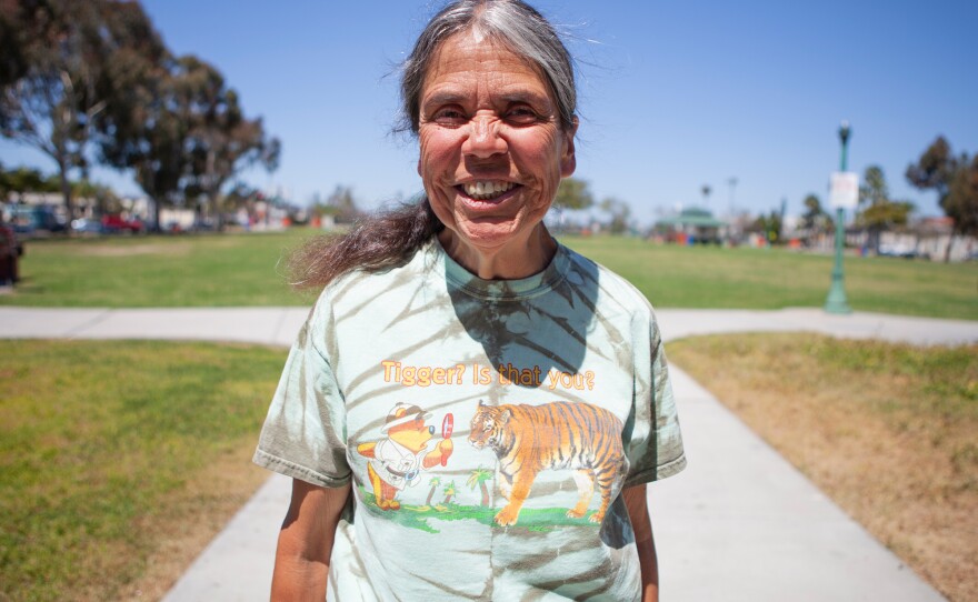 Mass transit user Maria Cortez, who only uses buses and trolleys for transportation, is shown in City Heights on April 17, 2019.