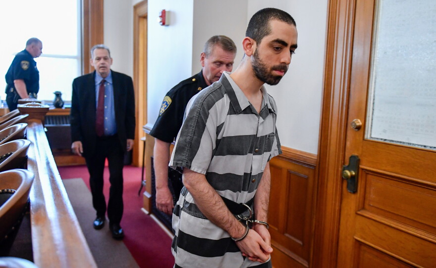 FILE - Hadi Matar walks in to the Chautauqua County court in Mayville, N.Y., May, 16, 2025.