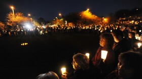 People gather for a vigil at University Medical Center for U.S. Rep. Gabrielle Giffords (D-AZ), who was shot during an event in front of a Safeway grocery store January 8, 2011 in Tuscon, Arizona. 