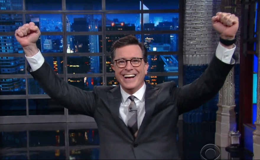 On Wednesday's Late Show, host Stephen Colbert celebrated not being fired from his job. A #FireColbert campaign began after the comedian unleashed a barrage of insults aimed at President Trump on Monday's show.