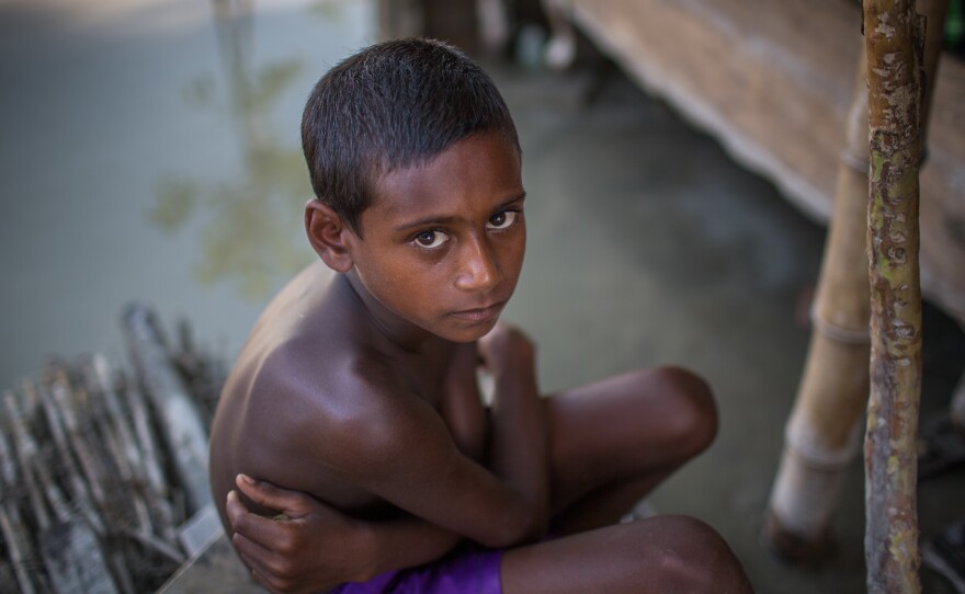 A boy on the outskirts of Bogra, Bangladesh, on Aug. 20.