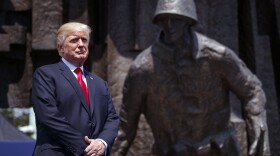 President Donald Trump listens as he is introduced to deliver a speech at Krasinski Square at the Royal Castle, in Warsaw, July 6, 2017.