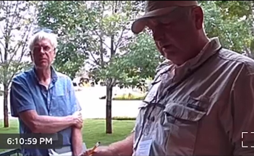 Two canvassers are seen last year on Michelle Garcia's front-door camera in in Pueblo, Colo. The men said they were "doing a voter verification project."