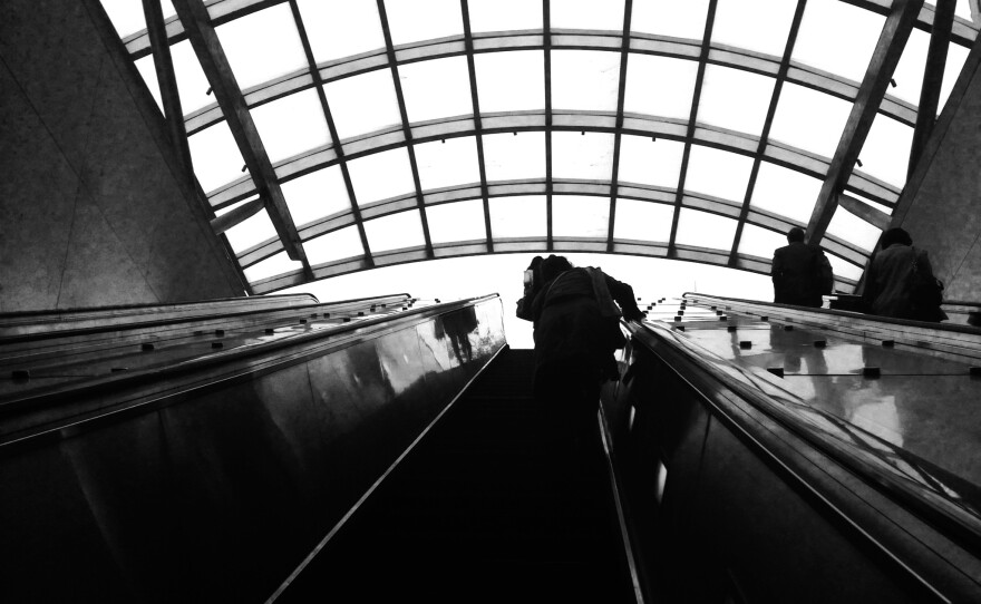 Becca Bullard commutes every day from Arlington, Va., via Metro's Virginia Square station to her work in downtown Washington, D.C.
