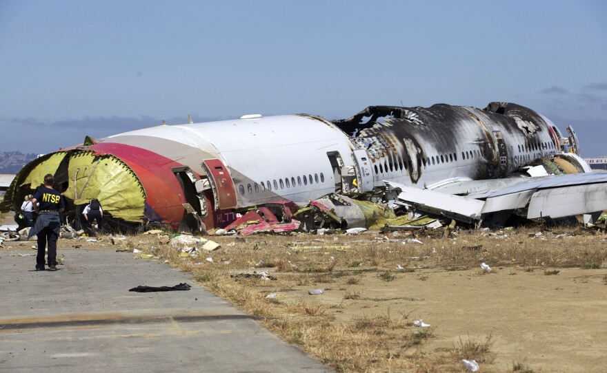 NTSB investigators at the scene of the Asiana Flight 214 crash in San Francisco.