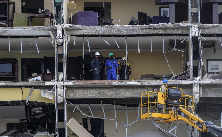 Rescue workers search through rooms days after a deadly explosion destroyed the five-star Hotel Saratoga in Old Havana, Cuba.