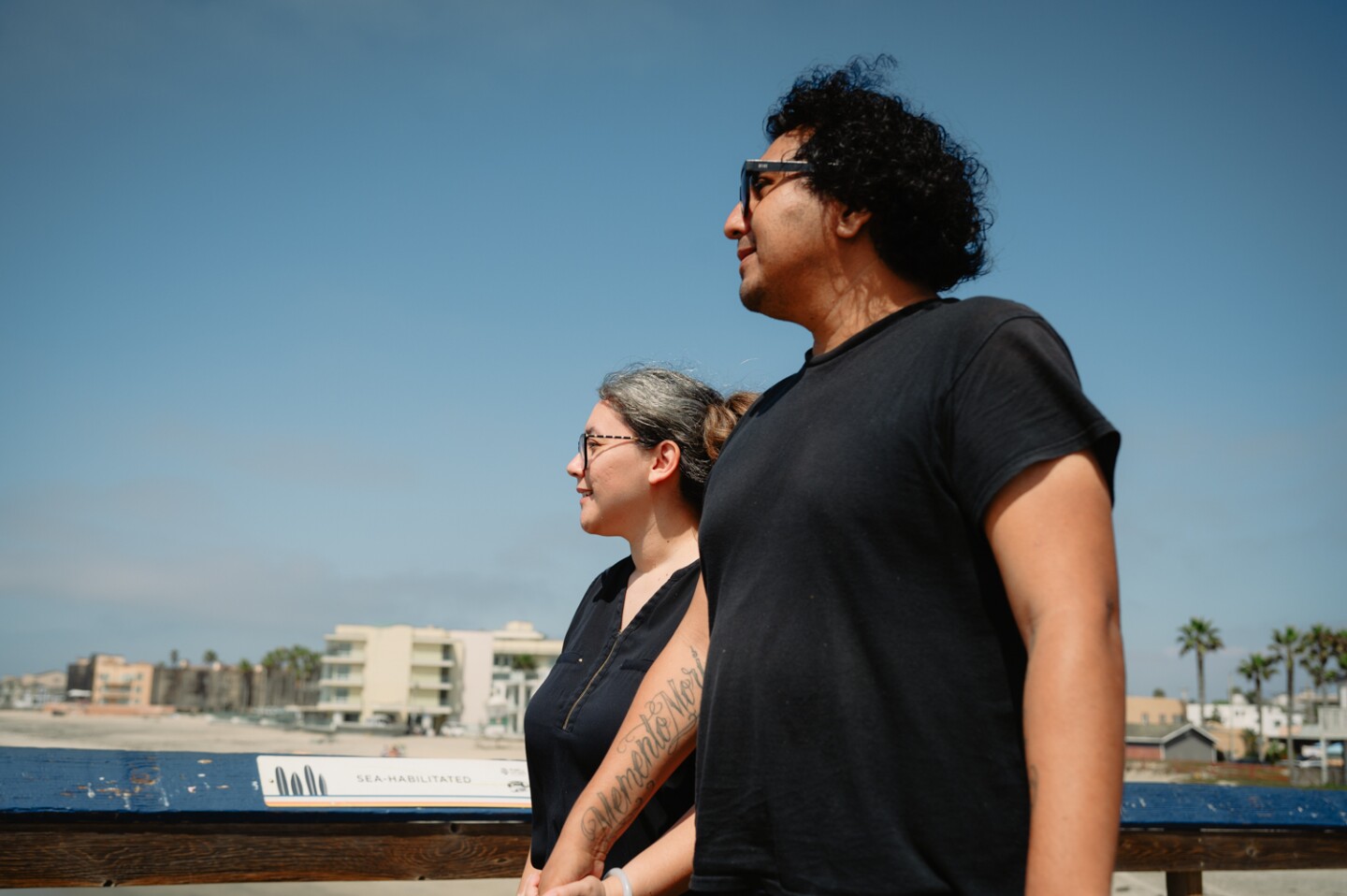 Chula Vista residents Crystal, left, and Angel Dandrea Montalvo enjoy a day out at the IB Pier in Imperial Beach, Calif. on Sept. 3, 2024.