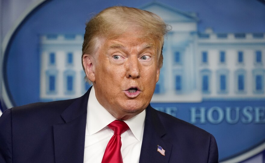 President Trump's amplification of a false "birther" conspiracy against Sen. Kamala Harris has been criticized.