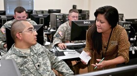 Soldiers at Joint Base Lewis-McChord manage their education records and request Tuition Assistance, July 2012.