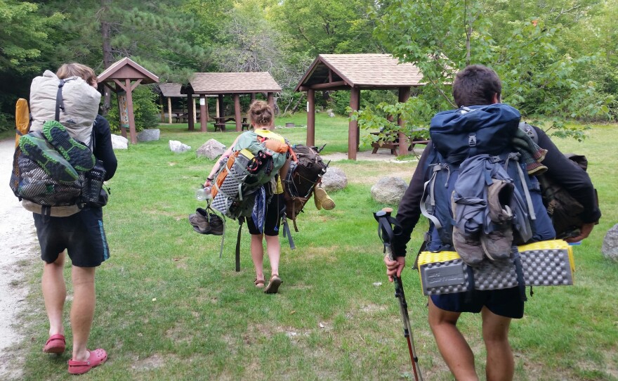 Matthew Fioramonti, Kacy Hale and Alexander Scherlitzky at Stream Campground after completing the entire Appalachian Trail.