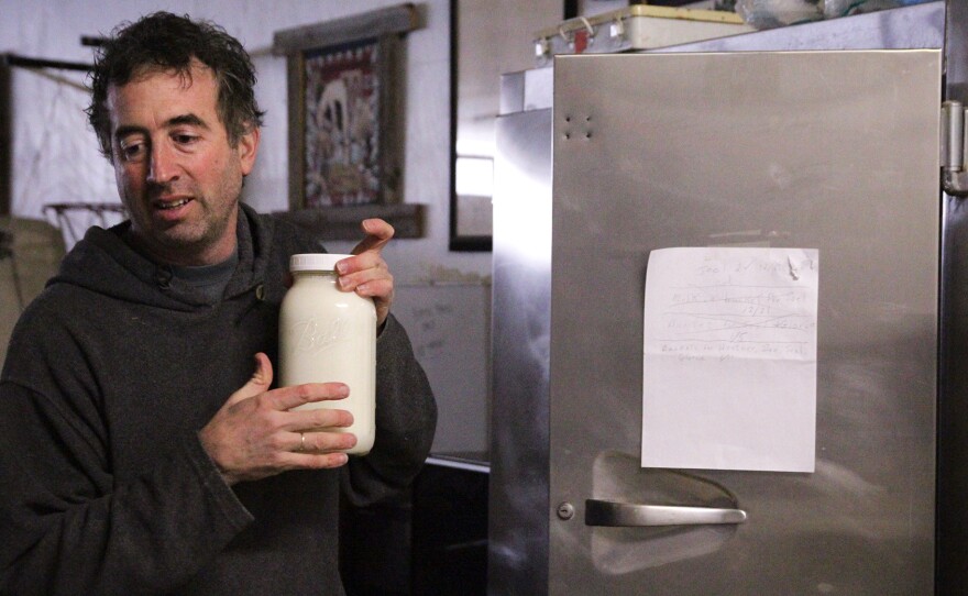 Joel Gruver is the milkman for a group of raw milk drinkers in Macomb, Ill.