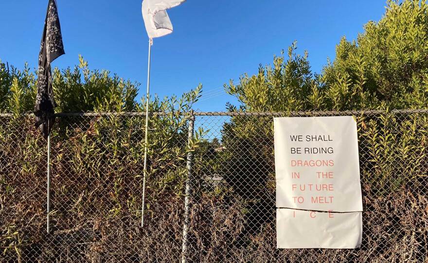 John Calavitta-Dos Santos' vandalized artwork hangs in the Mesa College drive-thru exhibition on Nov. 30, 2020.