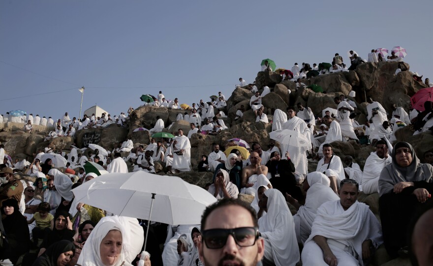 Muslim pilgrims pray on a rocky hill known as Mount Arafat.