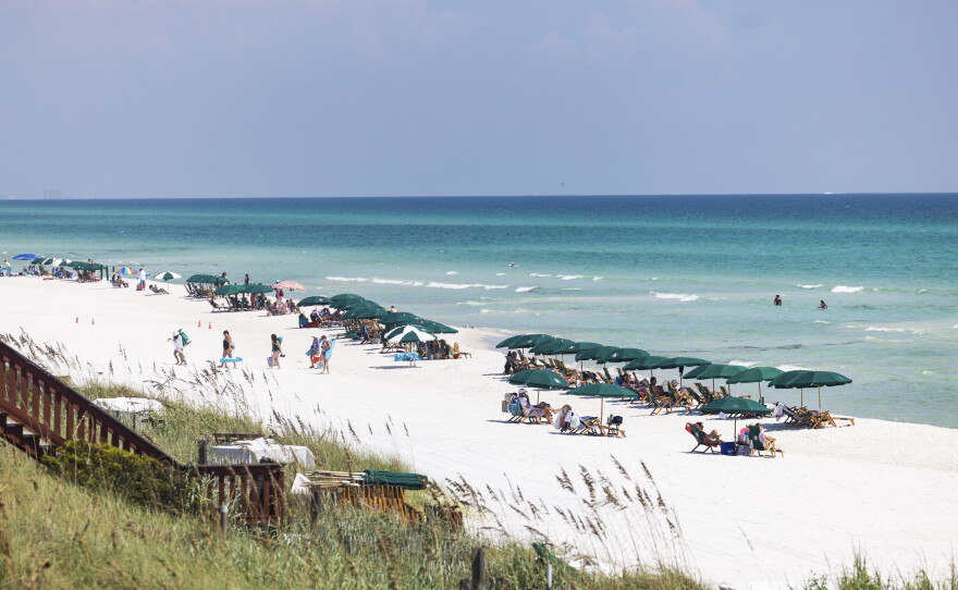 Beachgoers in Rosemary Beach, one of several communities that have experienced explosive growth in the last decade. 