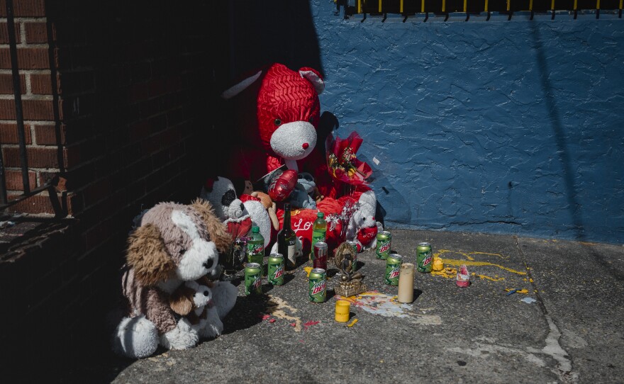 A makeshift memorial sits outside for someone who was recently shot in East Germantown in Philadelphia on Monday, March 25, 2024.