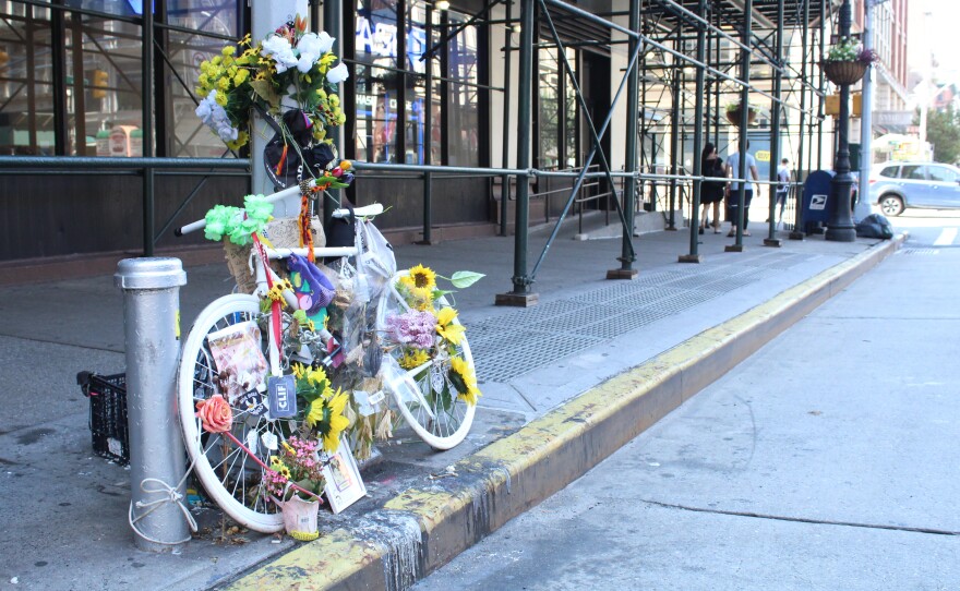 Eight people have been killed in New York while riding their bikes since June, bringing the total number of deaths so far this year to 19. Above a memorial to one of the cyclists killed, Robyn Hightman.