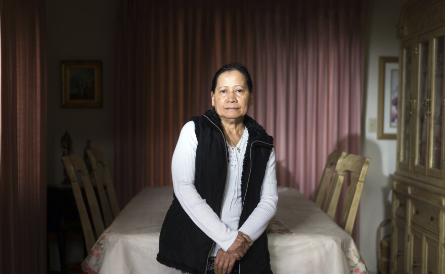In this Friday, March 1, 2019 photo, Sonia Deza poses for a photograph at her home in Antioch, Calif. Deza worked for years as a caregiver where she earned $2 an hour from Publico. Residential senior care homes are treating workers as indentured servants – and profiting handsomely. The profit margins can be huge and, for violators of labor laws, hinge on the widespread exploitation of thousands of caretakers, many of them poor immigrants effectively earning $2 to $3.50 an hour to work around the clock.