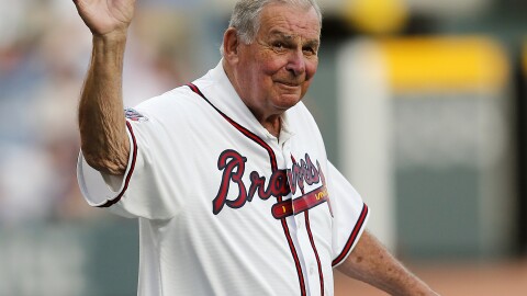 Former Atlanta Braves manager Bobby Cox waves to the crowd as he is introduced at a ceremony to open the Braves' new stadium before a baseball game against the San Diego Padres, April 14, 2017, in Atlanta.