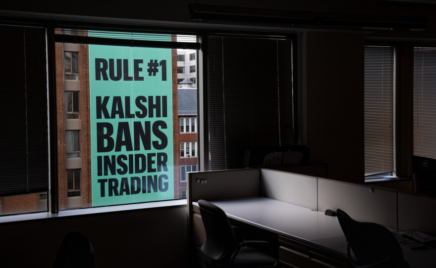 A banner for the prediction market platform Kalshi hangs from a building on April 1.