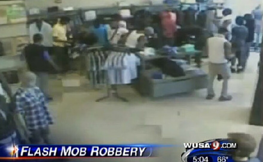 An image from a security camera at a clothing store in Washington, D.C., shows a flash mob robbery in April. Thousands of dollars' worth of merchandise was stolen, police said.