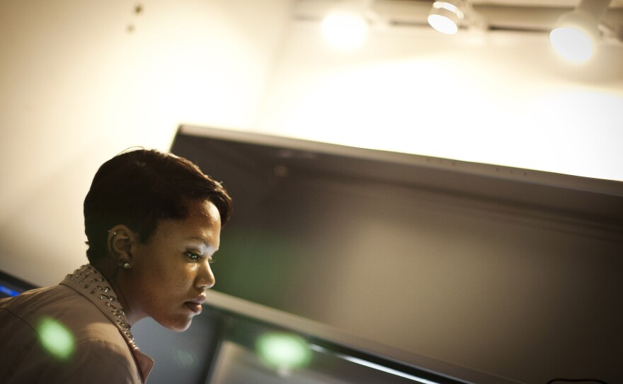 Jasmine Chestnut at her internship at the Center for American Progress in Washington. An at-risk student, Chestnut had almost given up on college when a nonprofit network supported by the government's Social Innovation Fund helped her get back on track.