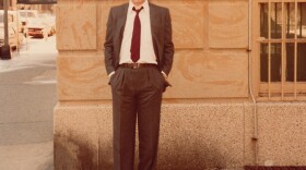 Raúl Juliá in front of his home in New York City.