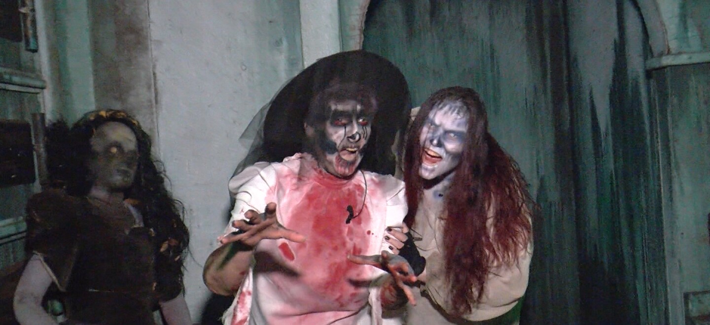 KPBS arts reporter Beth Accomando and Luca Dismukes ready to scare attendees at The Haunted Trail of Balboa Park. Sept. 25, 2025