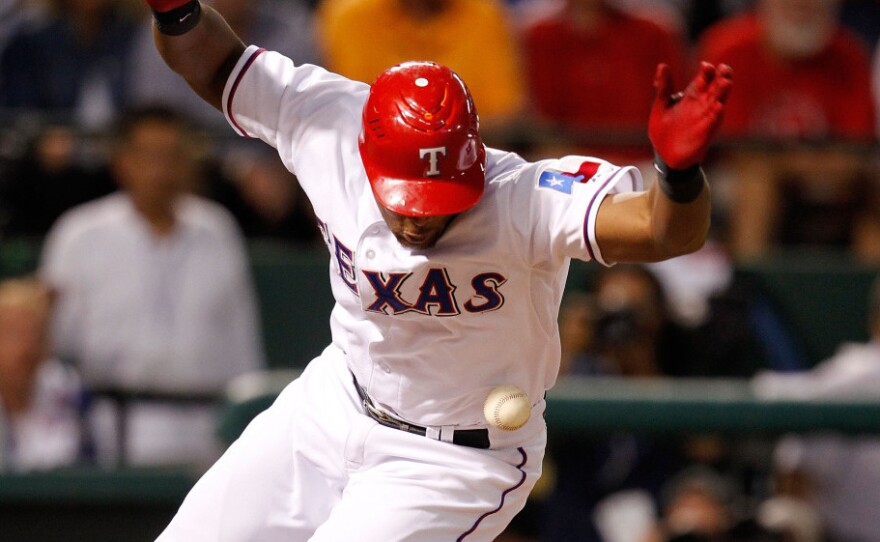 <p>Adrian Beltre of the Texas Rangers is hit by a pitch from the Tampa Bay Rays' James Shields on Oct. 1 at Rangers Ballpark in Arlington, Texas.</p>