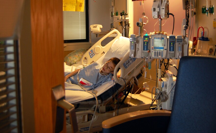 Joey lies in bed at Cincinnati Children's Hospital, not long after receiving his first dose of the immunotherapy drug Keytruda.