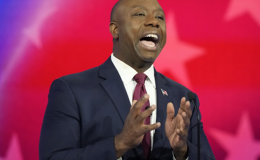 Republican presidential candidate Sen. Tim Scott, R-S.C., speaks during a Republican presidential primary debate hosted by NBC News on Wednesday in Miami.