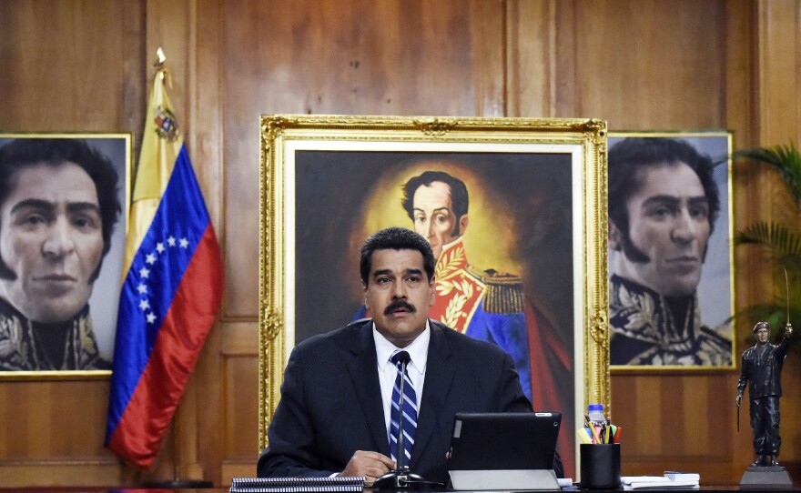 Venezuela's President Nicolas Maduro speaks at the presidential palace in the capital Caracas on Dec. 30, 2014. Venezuela's economy has entered a recession and is suffering from high unemployment, many shortages and inflation of more than 60 percent. The country depends heavily on oil exports and revenue is down sharply due to lower oil prices.