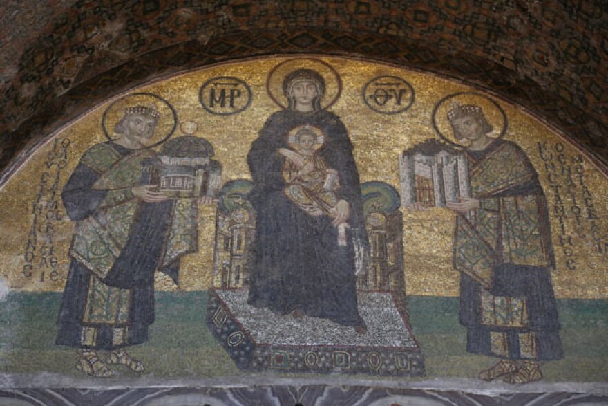 Within the south vestibule is a golden mosaic featuring Justinian presenting the Hagia Sophia to the Virgin Mary and the baby Jesus.