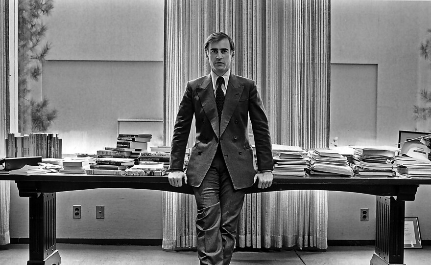 Jerry Brown at desk.