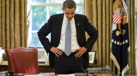 President Obama stands in front of his desk at the White House. "Obama's Deal" takes viewers inside the hand-to-hand combat between the White House, lobbyists and Congress over health care reform, to reveal the behind closed doors deals and tough tradeoffs made by an administration determined to take on one of the most difficult issues to cross the President’s desk during his first year in office.