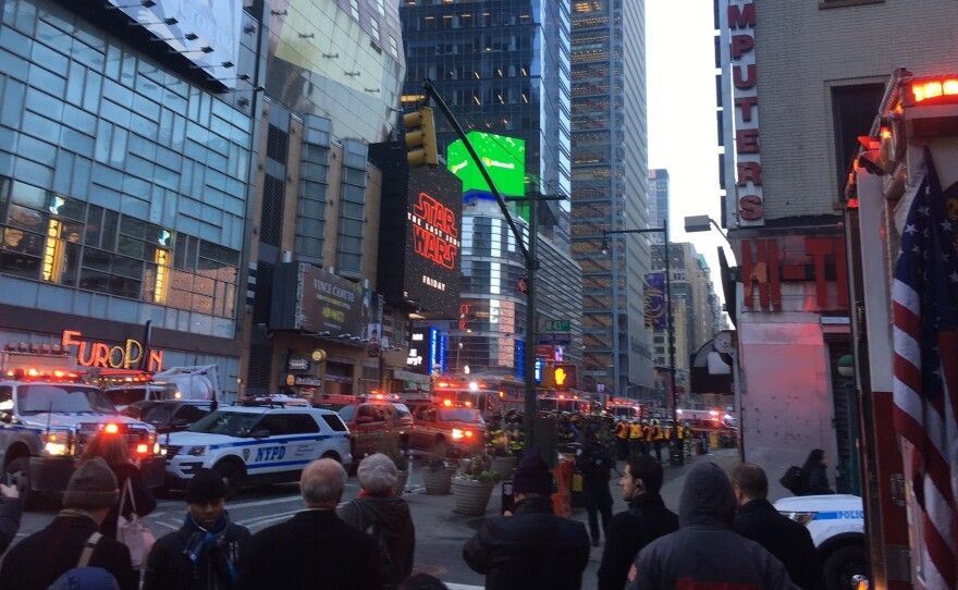 After an explosion a block away, police swarmed through Times Square in Midtown Manhattan.