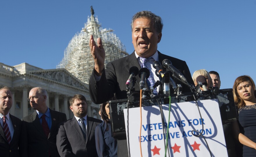 U.S. Rep. Juan Vargas, D-Calif., speaks Wednesday as U.S. military veterans, service members and immigration reform advocates look on during a press conference urging President Obama to move forward with immigration reform at the U.S. Capitol in Washington.