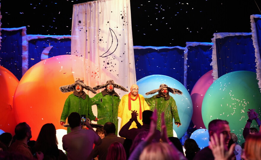 Russian clown and artist Slava Polunin performs with members of his company during Slava's Snowshow at Teatro Strehler in Milan on Feb. 6, during the Winter Olympics.