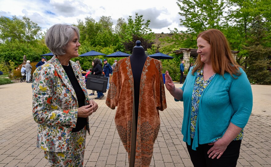 Deborah Miller (left) appraises a Fortuny silk velvet jacket, ca. 1925, in Boise, Idaho. 