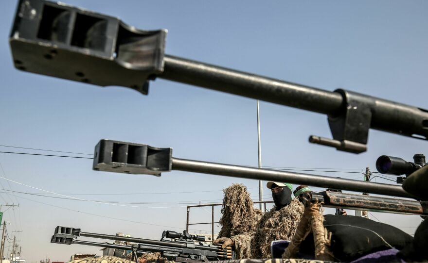 A fighter from the Qassam Brigades, the armed wing of the Hamas movement, is pictured amid long-range 50-caliber sniper rifles during an anti-Israel military show in Khan Yunis, in the southern Gaza Strip, on Nov. 11, 2019.