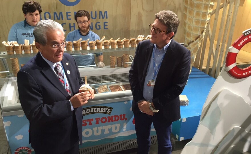 De Brum appears with the CEO of Ben & Jerry's, Jostein Soheim, at an event at the climate conference.
