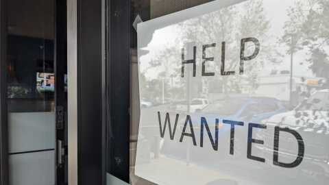 A help wanted sign is posted in the window of a Tierrasanta business. San Diego, Calif. March 31, 2022.