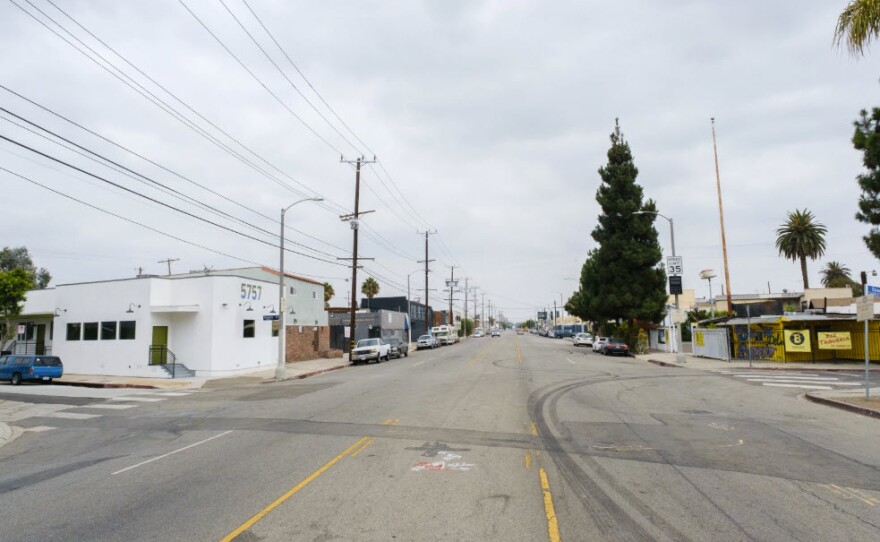 Looking east on West Adams Boulevard. From the crosswalk at Fairfax Avenue, the next crosswalk a quarter-mile away is not visible. Undated photo.