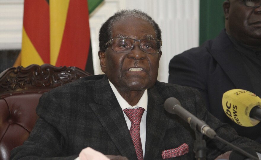 Zimbabwean President Robert Mugabe delivers his speech during a live broadcast at State House in Harare on Sunday. Mugabe has baffled the country by ending his address on national television without announcing his resignation.