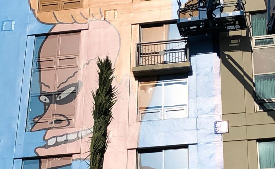 A mural depicting the character Beavis from the cartoon "Beavis and Butt-Head" is painted in honor of Comic-Con International. San Diego, Calif. July 18, 2022.