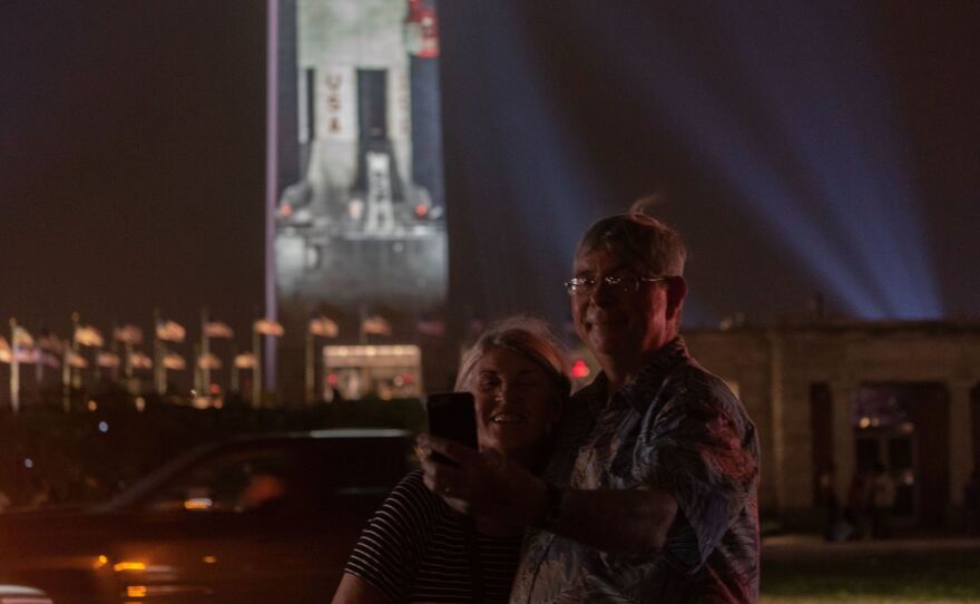 Sarah and Mark Moser traveled from Oakland, Calif., and were excited to see the projection. "I remember we watched the launch on TV when we were kids," Mark Moser said.