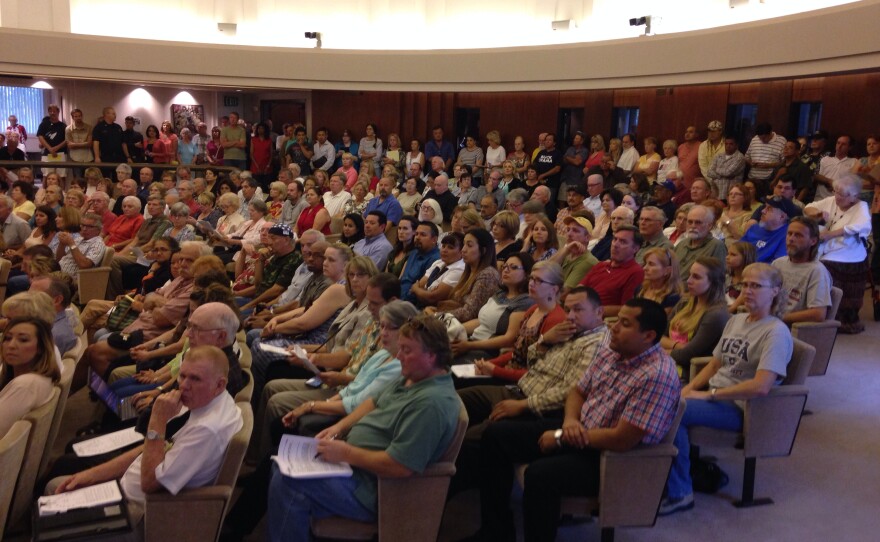 People packed the Escondido City Council chambers at a hearing on whether to allow a shelter for unaccompanied immigrant youth to open in a former nursing home, June 24, 2014. 